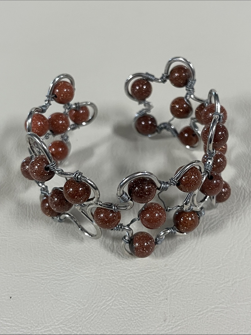 Sparkling Goldstone Bead Wire Cuff Bracelet